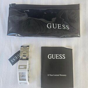 NWT Elegant Guess Watch with a Metallic Silver Finish White Trim.